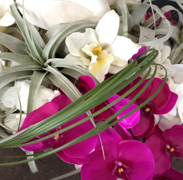 Nautilus shells, air plants and orchids made for a stunning, natural, yet colorful arrangement